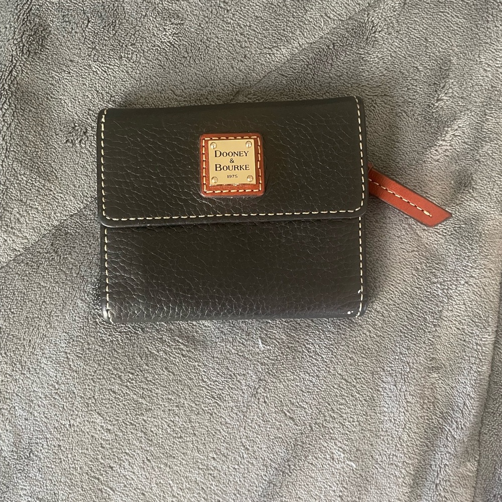 The Dooney & Bourke Pebble Grain Small Flap Wallet with Red Accents 1975 Edition